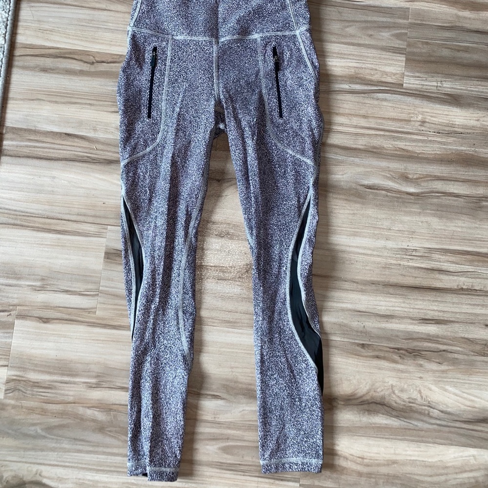 Lululemon leggings with two vertical zippers